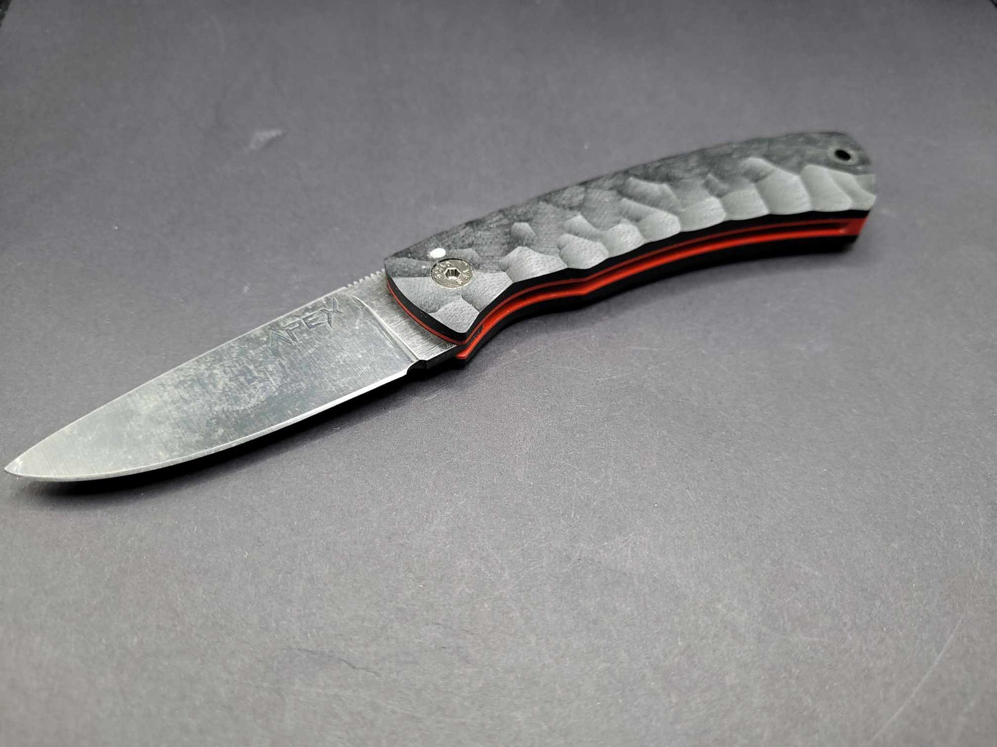 UK Legal friction folding knife Rock textured Black and Red G10