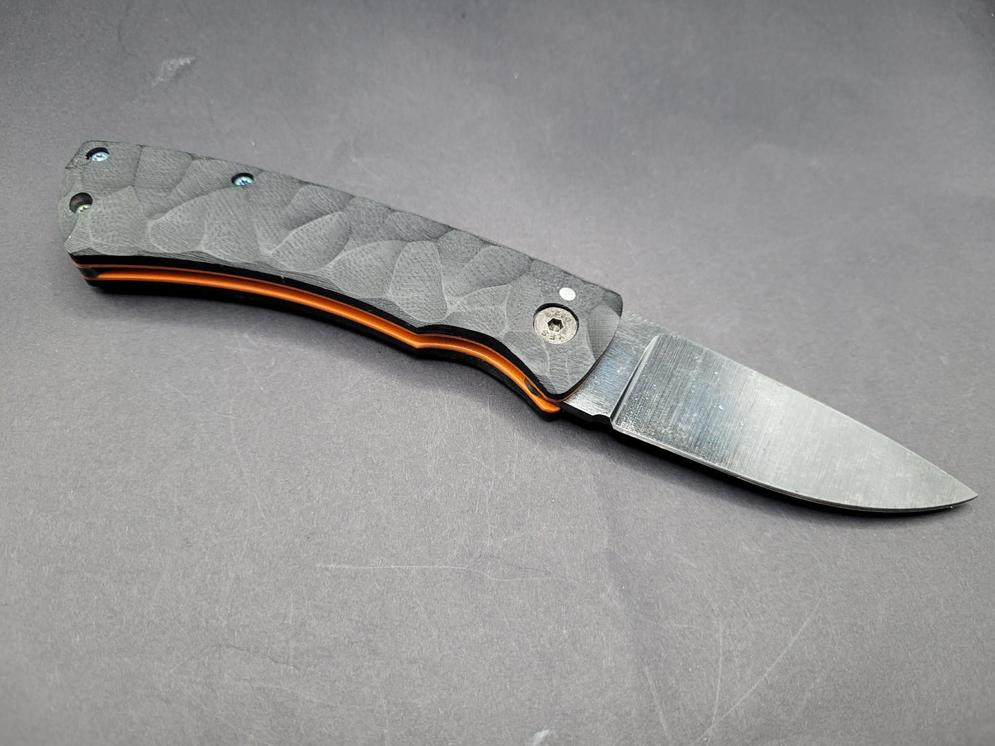 UK Legal friction folding knife Rock textured Black and Orange G10