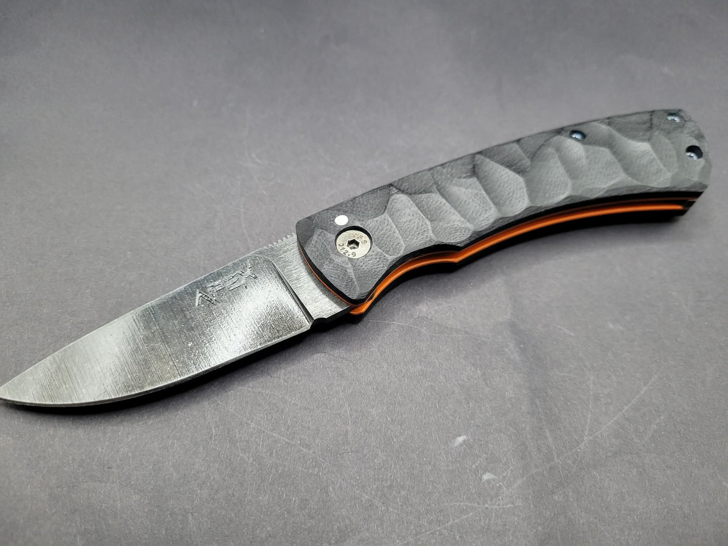 UK Legal friction folding knife Rock textured Black and Orange G10
