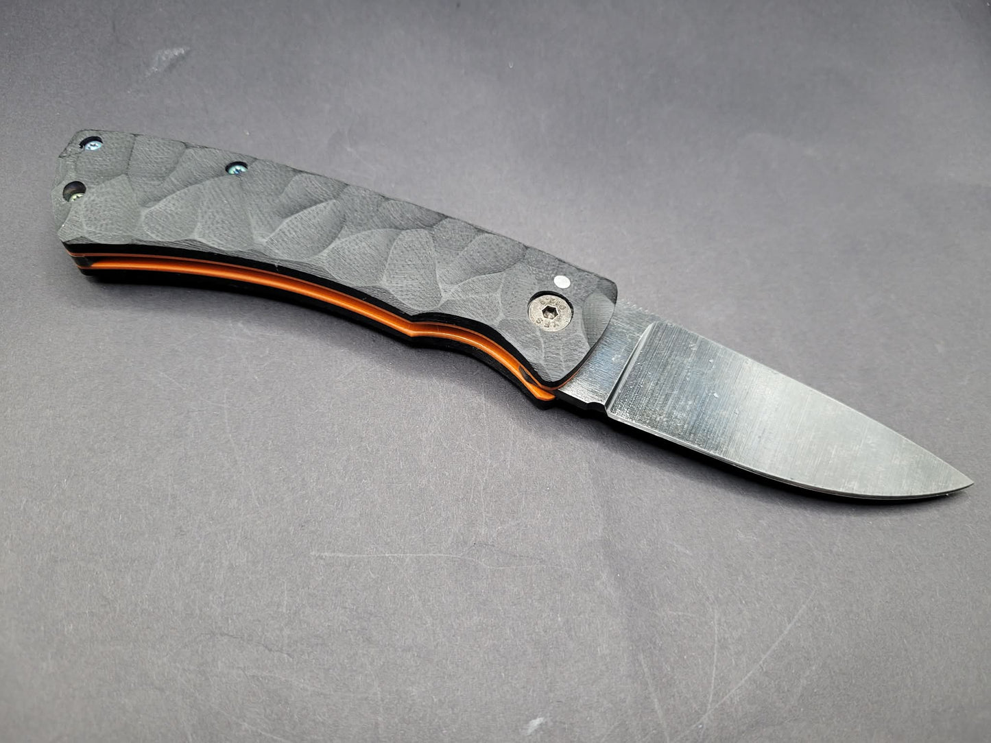 UK Legal friction folding knife Rock textured Black and Orange G10
