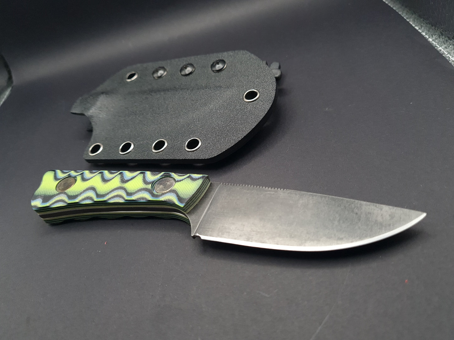 Drop point fixed blade utility knife