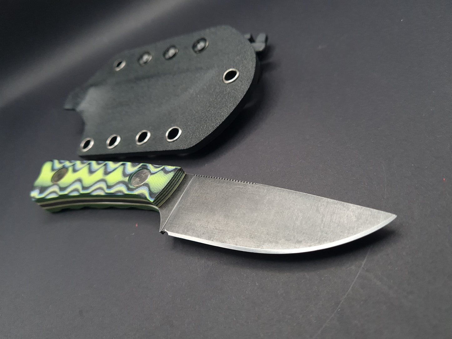 Drop point fixed blade utility knife